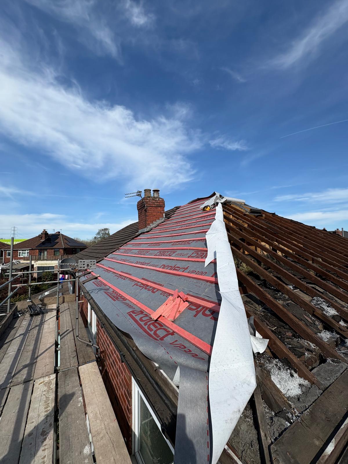 Membrane and battens on one slope, bare rafters on the other